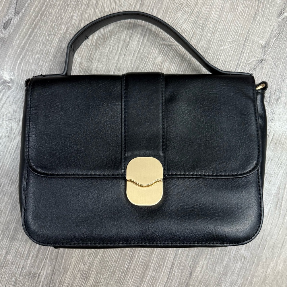 Small black purse with handle and cross body
